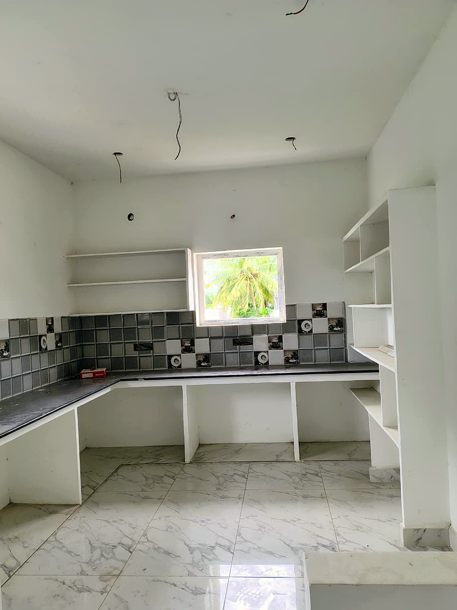 Kitchen with granite platform and designer tiles